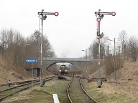 29.03.2010, Mikołajki, pociąg TKPSc 900371 relacji Olsztyn Główny - Orzysz, prowadzi SM42-1110, na popychu SU46-010